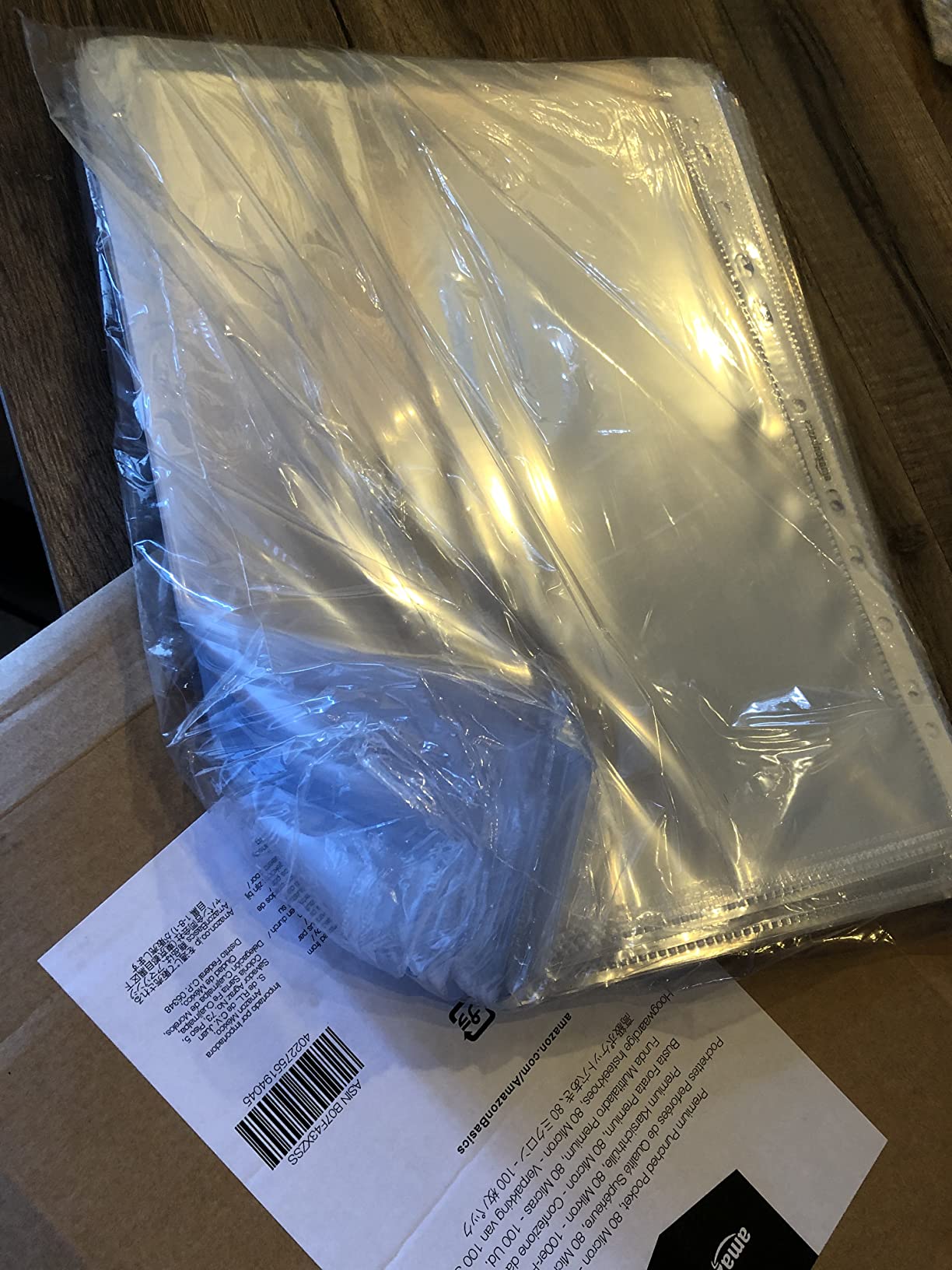 AmazonBasics Buste Forate A4 80 Micron 100 Pezzi Antiriflesso