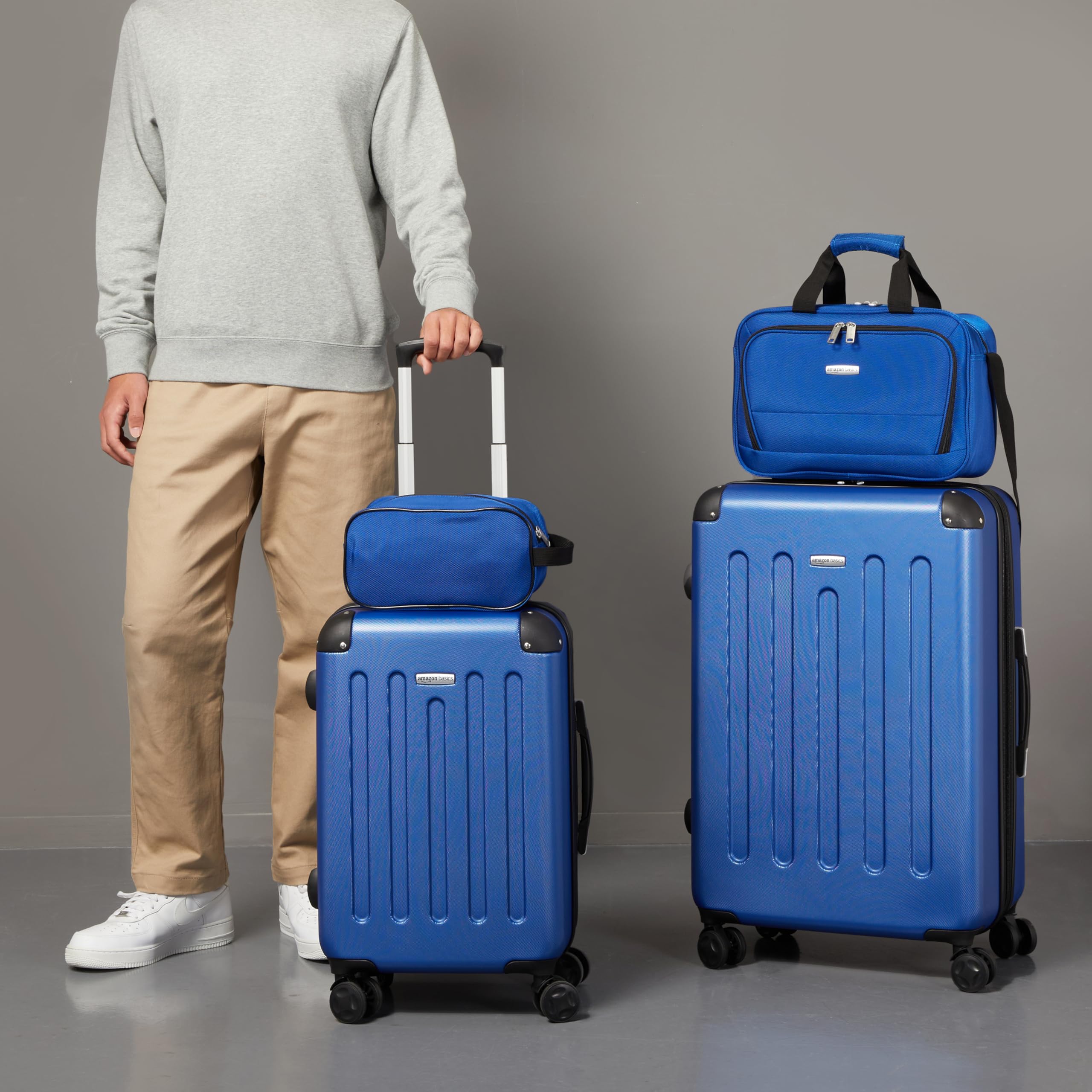 Amazon Basics Set 4 Valigie Rigide Blu Navy Espandibili